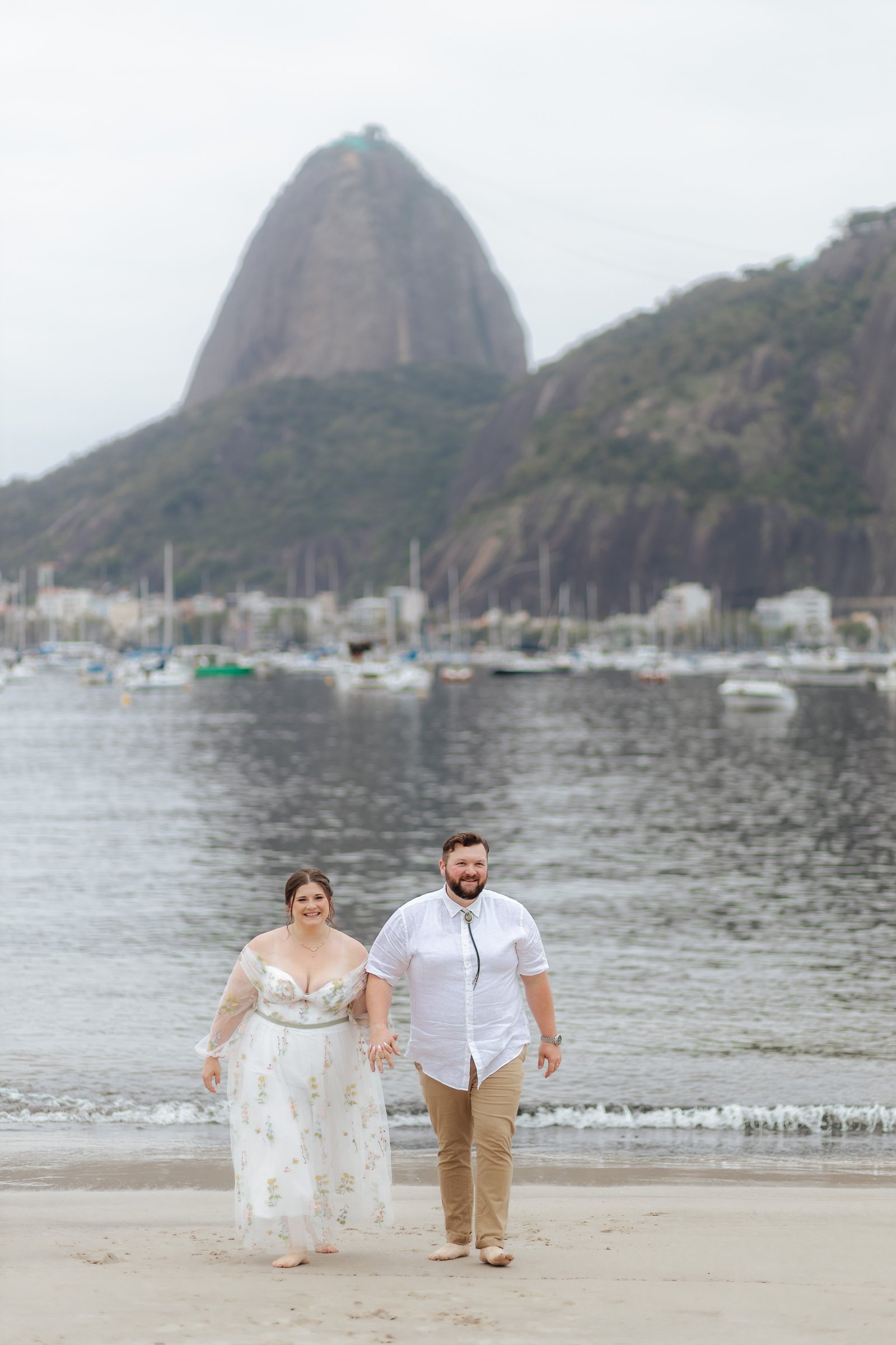 Bride with open back dress and Sugarloaf Mountain view, Rio de Janeiro wedding